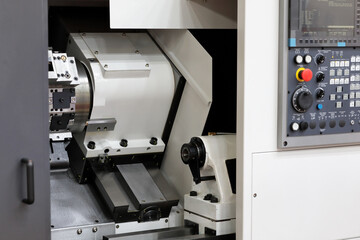 metalworking CNC lathe machine with turret head © gen_A