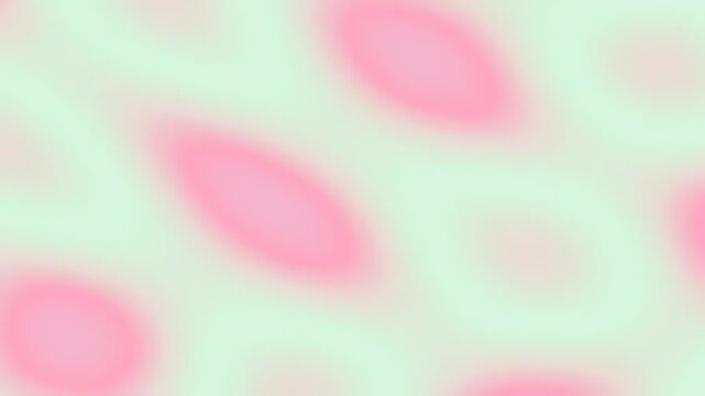 Abstract soft pastel background with blurred pink and light green shapes.