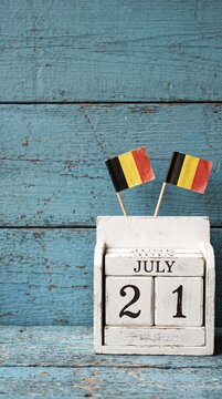 July 21 Wooden calendar Concept independence day of belgium and Belgium national day.Vintage tone