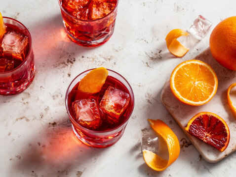 Negroni cocktails with orange peel garnish