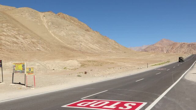 Magnetic Hill in Leh Ladakh India gravity hill located on the Leh Kargil Srinagar National Highway. Phenomenon That Defies Gravity vehicles in neutral gear appear to roll uphill
