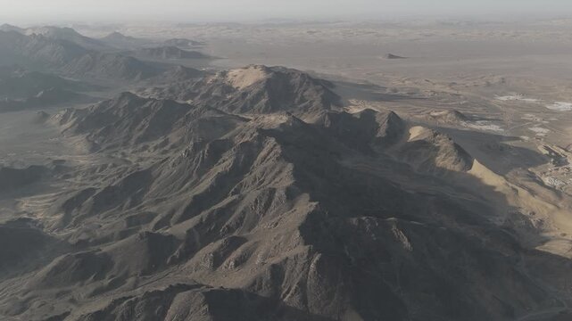 High altitude drone top down view of rugged mountain ridges in Balochistan