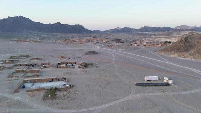 Aerial view of a remote outpost structure in Balochistan desert landscape