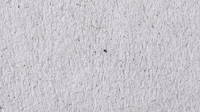 Minimalist white paper texture background with organic cinematic.ideal for artistic animation andeffects,
 Abstract rough cold press grain background for artistic video.Stop motion animation.