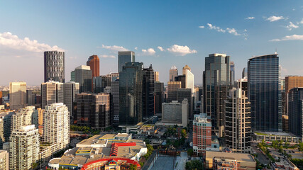 Fototapeta premium Calgary, Alberta - July 10, 2024: Aerial view of Calgary skyline on a beautiful summer sunset, Alberta - Canada