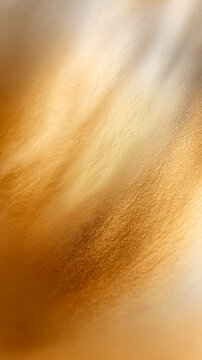 Abstract golden metallic texture background with soft light