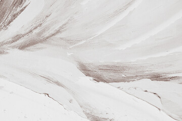Obraz premium Horizontal macro top down shot of white texture paste brushstrokes applied to a brown primed artist canvas creating a minimalist abstract pattern on surface