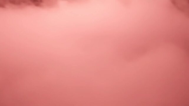 Abstract vibrant reddish-pink coral smoke texture background. Dense fog or atmospheric mist effect for design overlays, conceptual backdrops, and modern graphic resource.