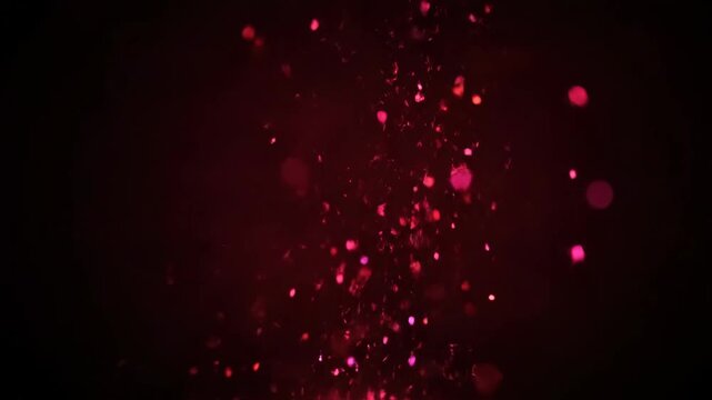 Dynamic abstract dark red background with glowing bokeh particles and small rising dust elements, creating a magical atmospheric overlay or backdrop.