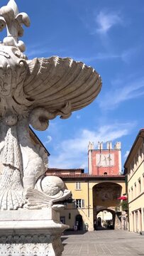 Camaiore historical center main square with fountain. The fountain in Piazza San Bernardino, Camaiore, Lucca, Italy.