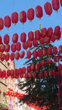 Chinese lanterns hanging across the street at chinatown in London