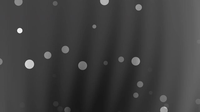Blurred  black grey gradient background white circles bokeh light pattern effect. Suitable for modern backgrounds and design projects.