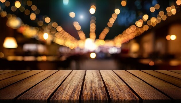 image of wooden table in front of abstract blurred restaurant lights background