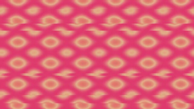 Abstract background with a repeating pattern of soft pink and peach blurred oval shapes.