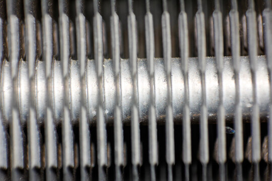 Macro View of Industrial Metal Heat Sink Fins and Threaded Element