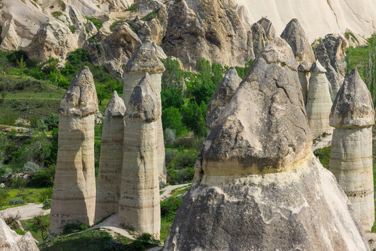 Close-up of Fairy chimneys of Love Valley in Cappadocia, Turkey. Unique rock formations in Goreme Historical National Park, a UNESCO World Heritage Site. 