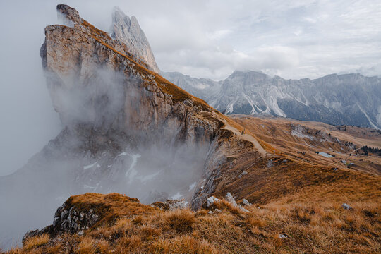 Scenic landscape view of the Dolomites Alps featuring the Odle mountain range and Seceda peak in Italy. Captures dramatic alpine scenery,