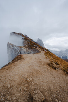 Scenic landscape view of the Dolomites Alps featuring the Odle mountain range and Seceda peak in Italy. Captures dramatic alpine scenery,