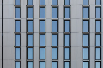 Obraz premium Modern office building glass window facade grid with building