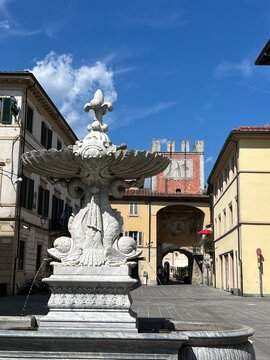 Camaiore historical center main square with fountain. The fountain in Piazza San Bernardino, Camaiore, Lucca, Italy.