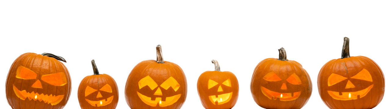 Halloween celebration decoration banner template - Group of funny spooky scary carved glowing orange pumpkins, isolated on transparent or white background png, jack-o-lantern
