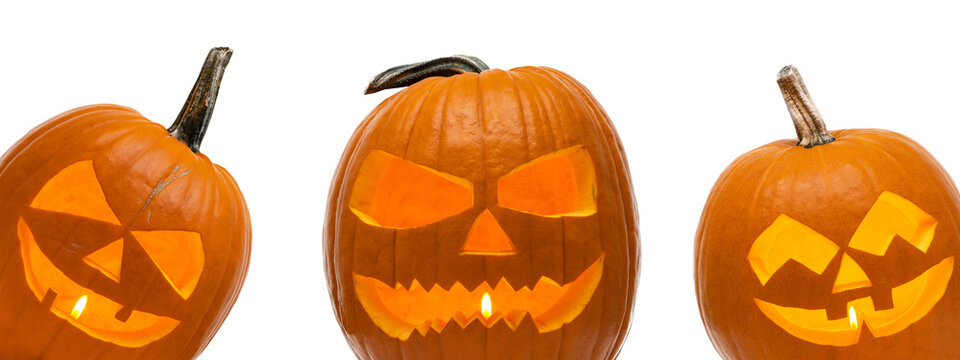 Halloween celebration decoration banner template - Group of funny spooky scary carved glowing orange pumpkins, isolated on transparent or white background png, jack-o-lantern