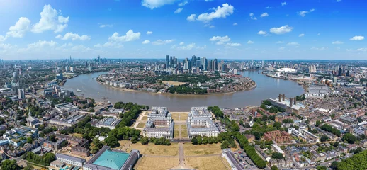 Panoramic aerial summer day view from Greenwich towards the Isle of Dogs with financial district Canary Wharf and City skyline of London, UK © moofushi