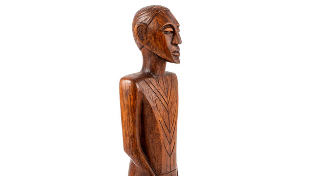 Traditional primitive wooden carved human figurine sculpture artifact isolated on a transparent background