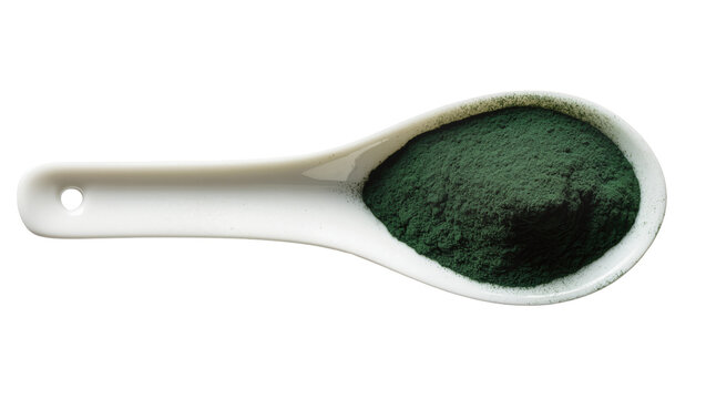 Isolated white ceramic spoon filled with healthy green spirulina powder, dietary supplement