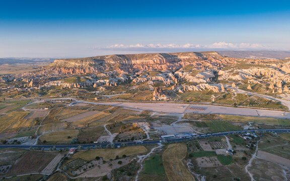 Aerial View of Uchisar Castle and Goreme Landscape in Cappadocia Nevsehir Turkey with Fairy Chimneys and Volcanic Rock Formations