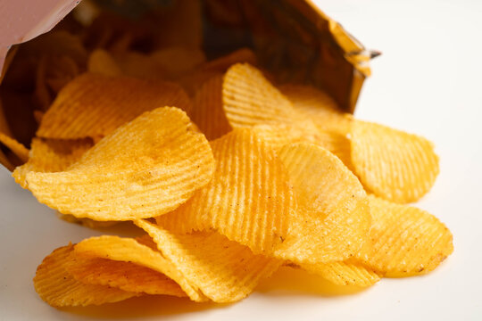 Potato chips delicious BBQ seasoning spicy for crips, thin slice deep fried snack fast food.