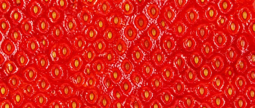 Close up of ripe strawberry skin texture background