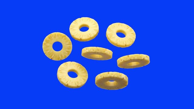 A dynamic 3D rendering of multiple sweet yellow pineapple rings scattered and suspended in mid-air. Isolated against a chroma key blue screen background, this food asset is perfect for dessert recipes