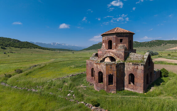 Aerial View of Kizil Kilise in Guzelyurt Aksaray Turkey with Early Christian Red Stone Church and Cappadocia Landscape