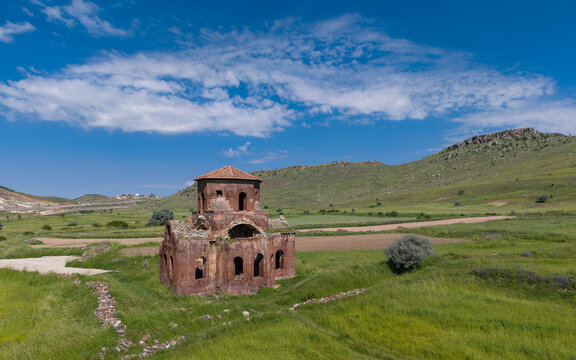Aerial View of Kizil Kilise in Guzelyurt Aksaray Turkey with Early Christian Red Stone Church and Cappadocia Landscape