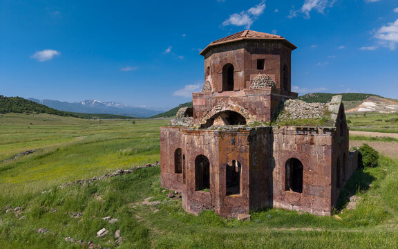 Aerial View of Kizil Kilise in Guzelyurt Aksaray Turkey with Early Christian Red Stone Church and Cappadocia Landscape