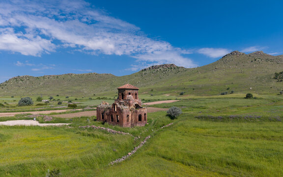 Aerial View of Kizil Kilise in Guzelyurt Aksaray Turkey with Early Christian Red Stone Church and Cappadocia Landscape