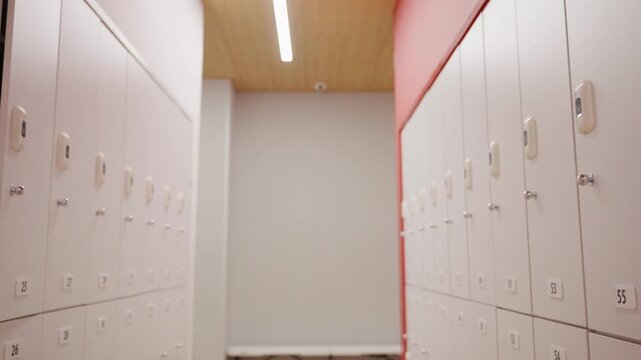 Empty locker room interior with white lockers