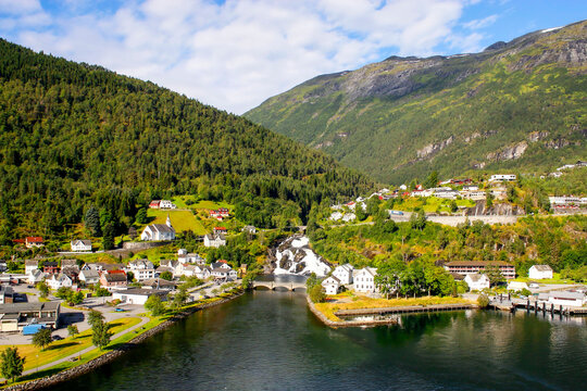 Hellesylt Village and Waterfall Surrounded by Fjord Mountains, Norway