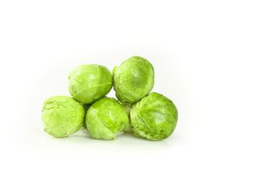 Fototapeta premium Fresh Green Brussels Sprouts Studio Photography on White Background