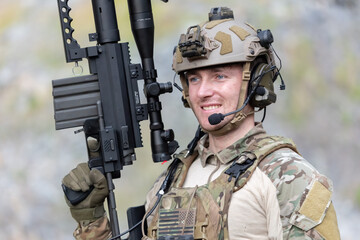 Fototapeta premium Military participate in a patrol in a rocky terrain