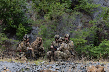 Fototapeta premium Solders having a discussion about the patrol mission