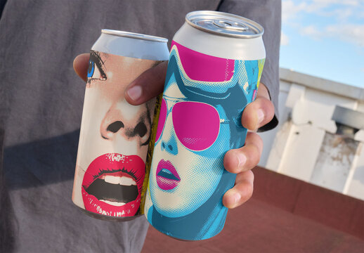 Mockup of Two Aluminum Cans Held in Hand