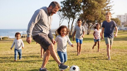 Naklejka premium A joyful dad plays soccer with his little girl by the coast for Family Day website banner