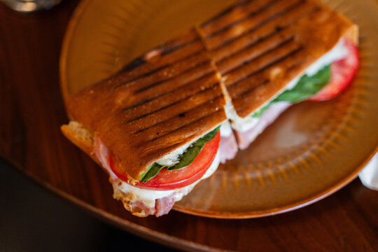 Grilled Flatbread Sandwich With Tomato And Greens Close Up