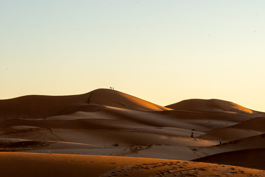Sunset over the sand dunes in the Sahara Desert, in Merzouga, Morocco