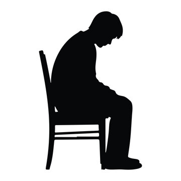 Silhouette of a person sitting on a chair, head bowed