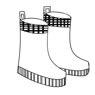 a couple of balck and white rubber rain boot