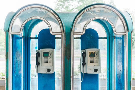Vintage Blue Telephone Booth with Dual Payphones