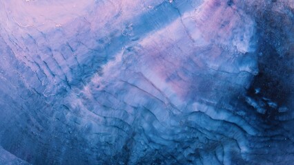 Naklejka premium Swirls of color in alcohol ink design are suited for various creative uses